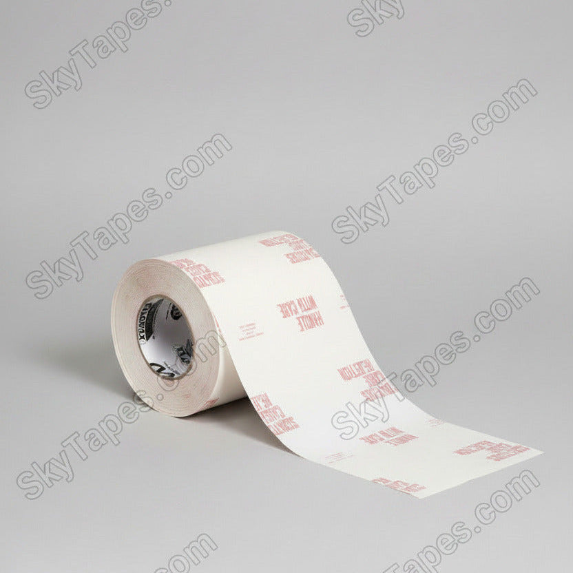 Protex 5 roll with paper tail extended showing repeating red "Scratches Cause Rejections" warning pattern