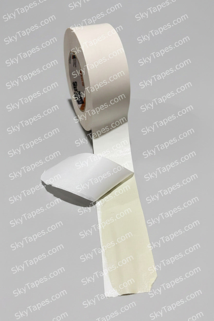 Shurtape DF 642 white double-coated cloth carpet tape roll with liner.
